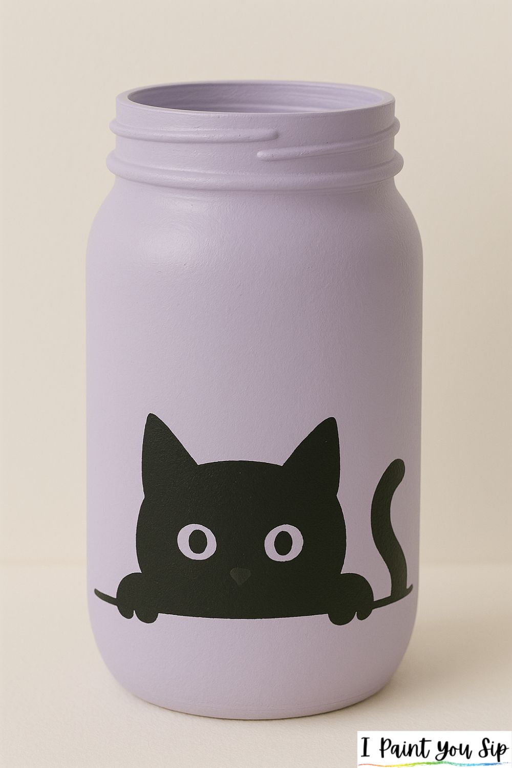 shadow cat peeking jar