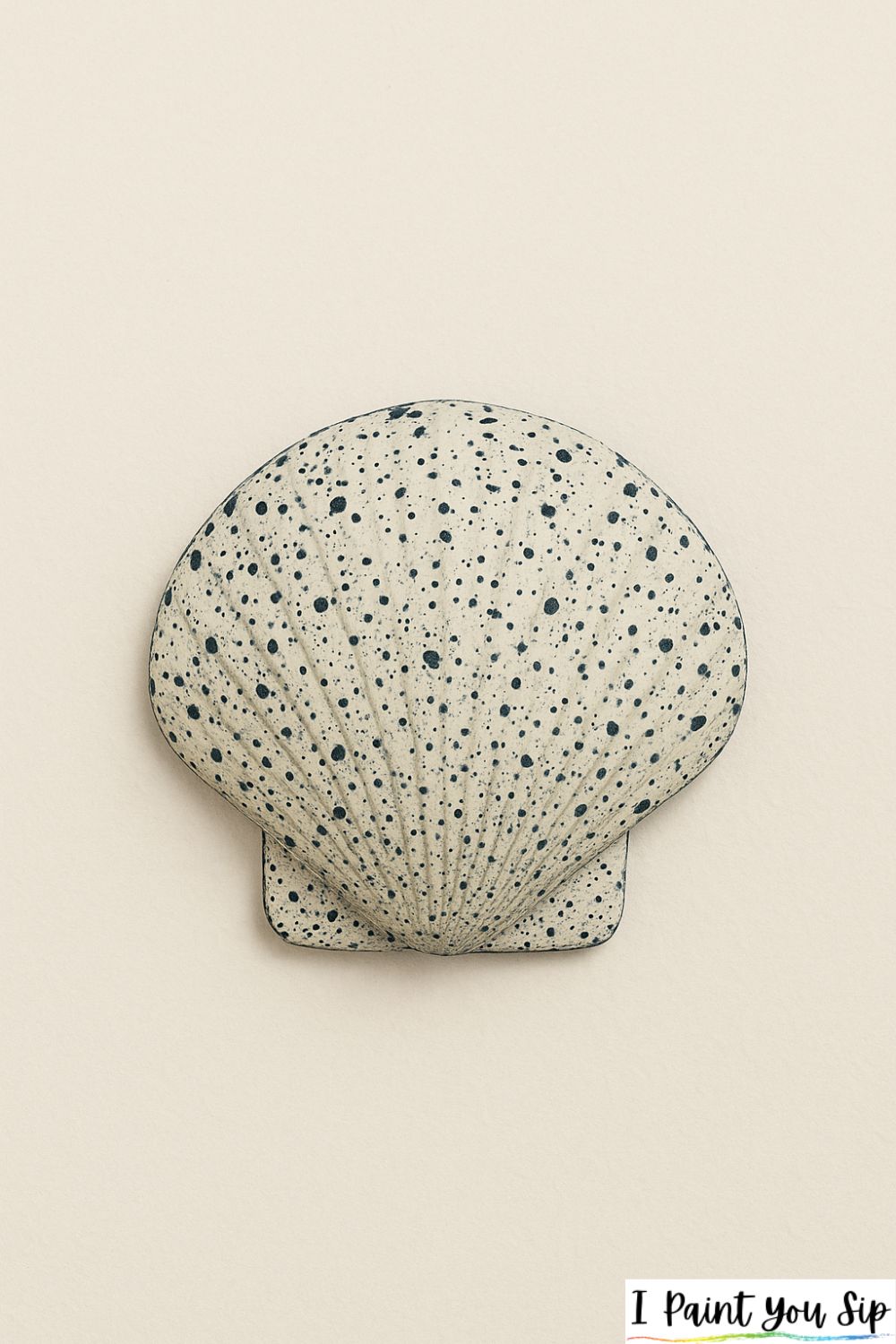 speckled mineral shell